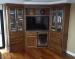 Distressed and glazed alder AV cabs