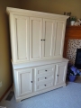 Painted bifold AV cabinet
