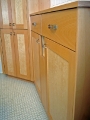 Beech and birdseye maple bathroom cabinets