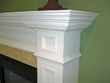 Traditional white fireplace mantel - detail
