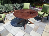 Teak & brass outdoor dining table
